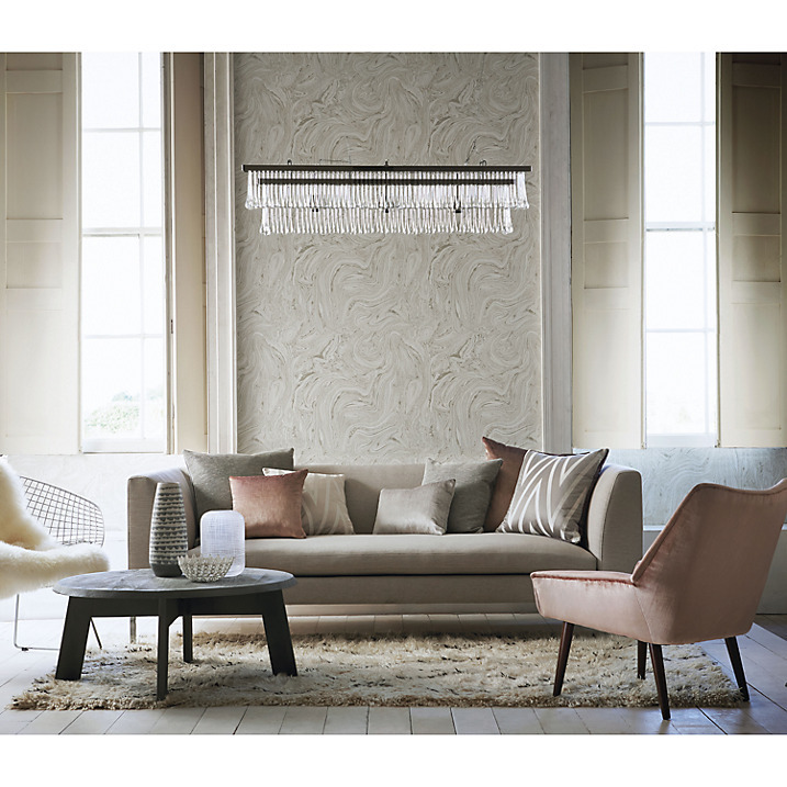 pared marmol salon sofa